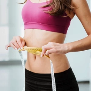 Weight Loss Kenosha WI Woman Measuring Waistline